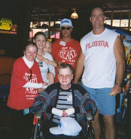 Bruce Gunn in the wheelchair, surrounded by, on left, Jennifer DePrizio, her sister Jody, her dad, and Randy Cameron